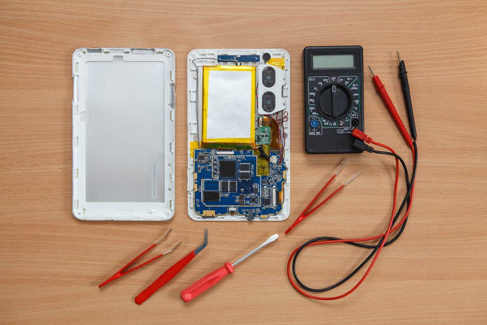 Disassembled Tablet With Tools