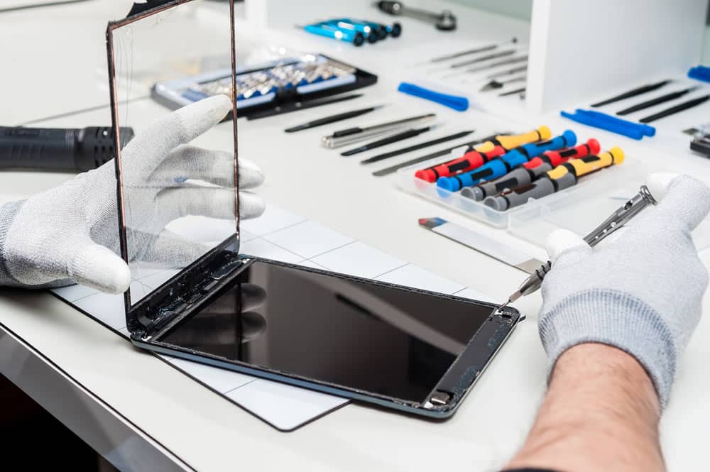 Showing Process Of Tablet Repair